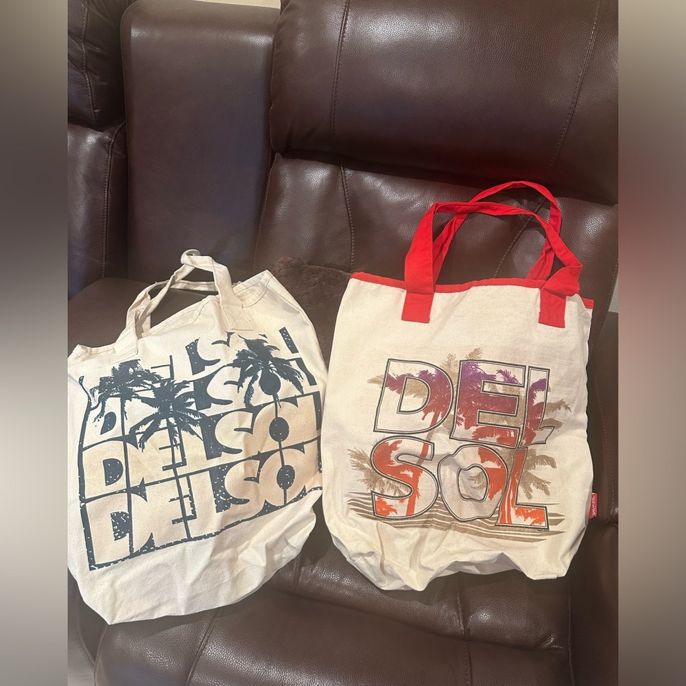 Two Del Sol color changing bags.NWOT